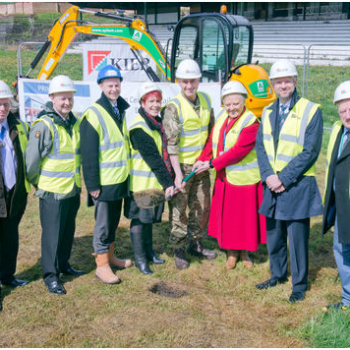 Dignitaries Cut the First Turf